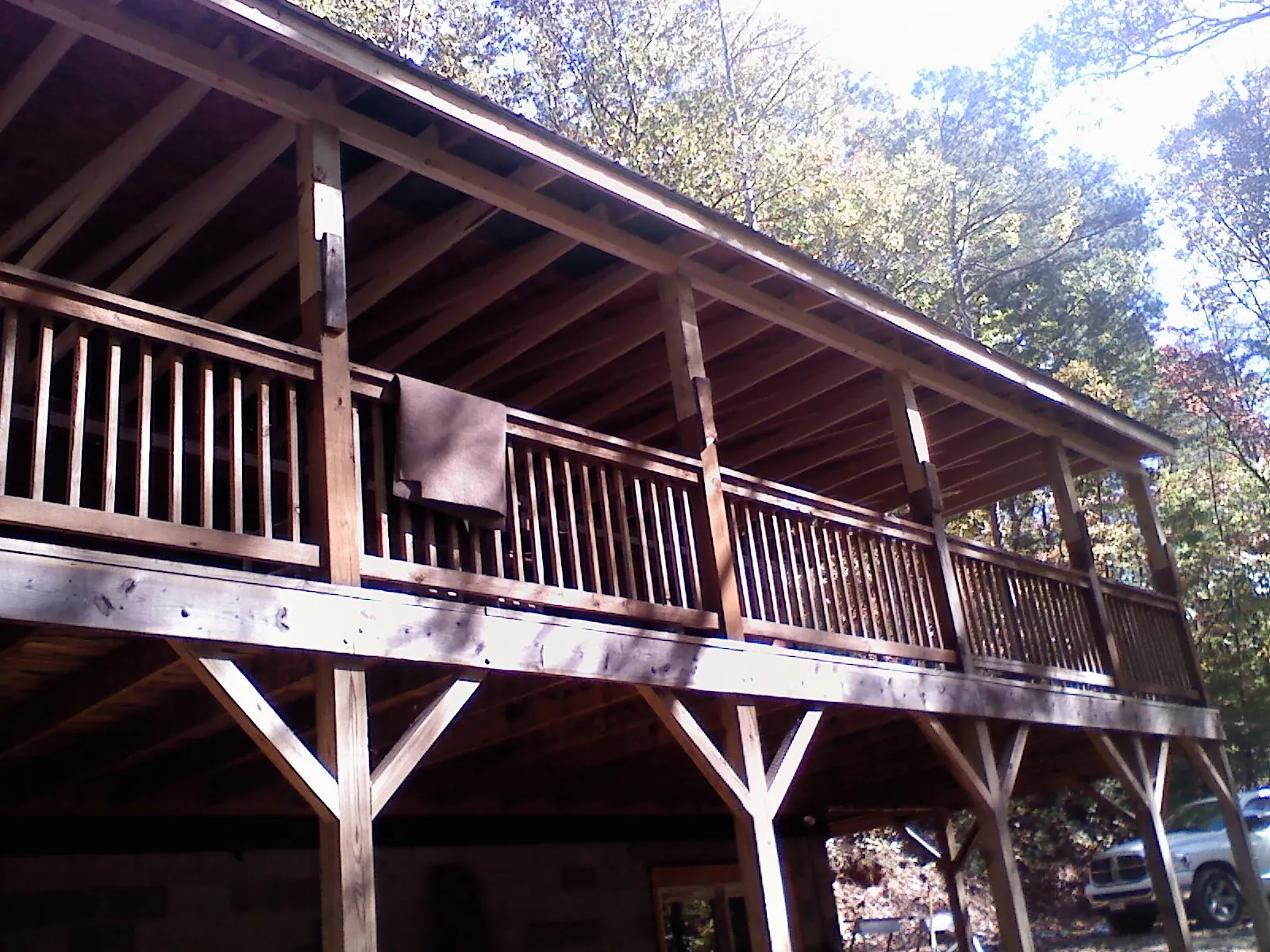 Timber framing under a new elevated porch and deck — Roof Leak Repair in Pembroke by Roofing Brothers